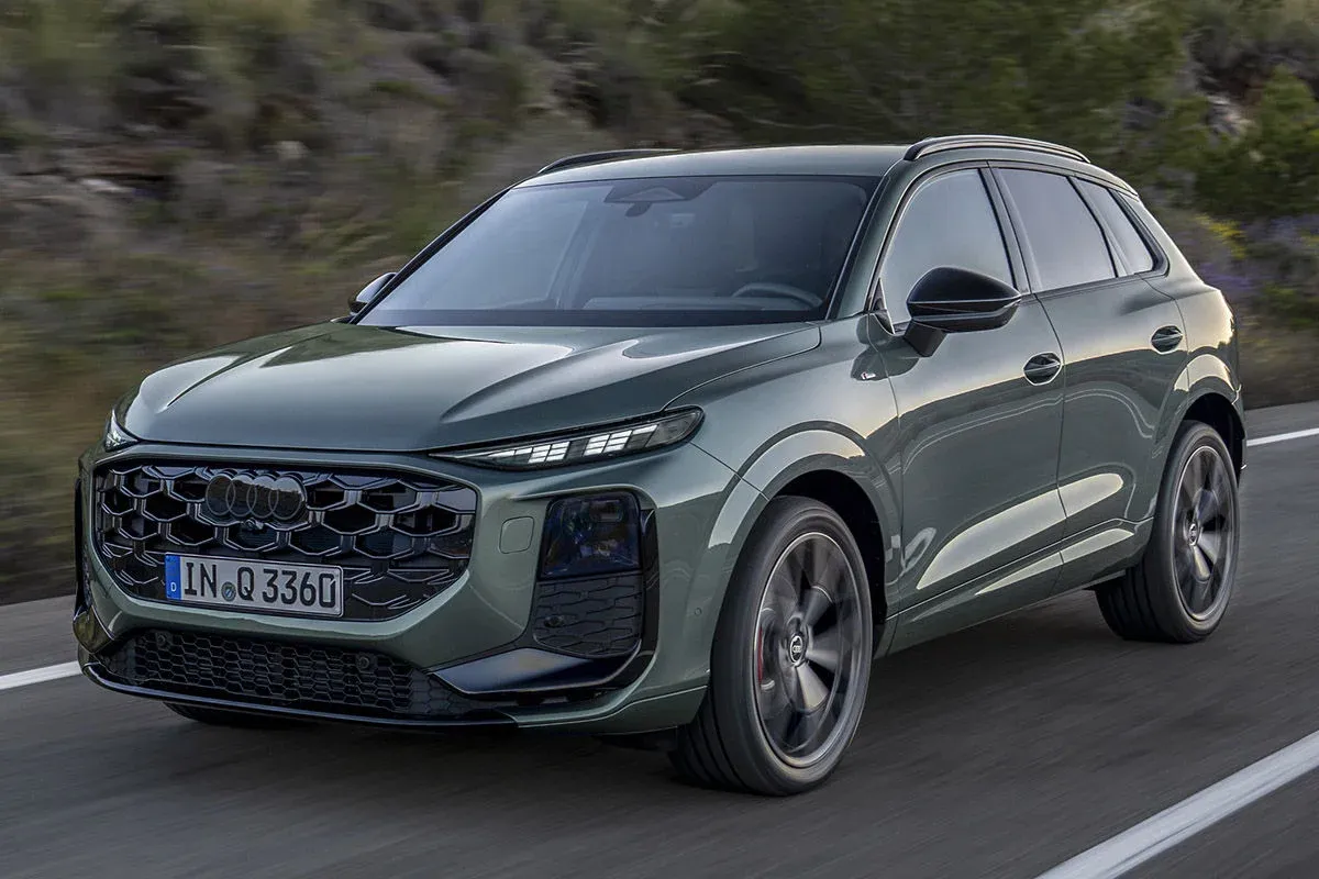 Dynamically drawn McLaren performance SUV as a camouflaged prototype on a winding road