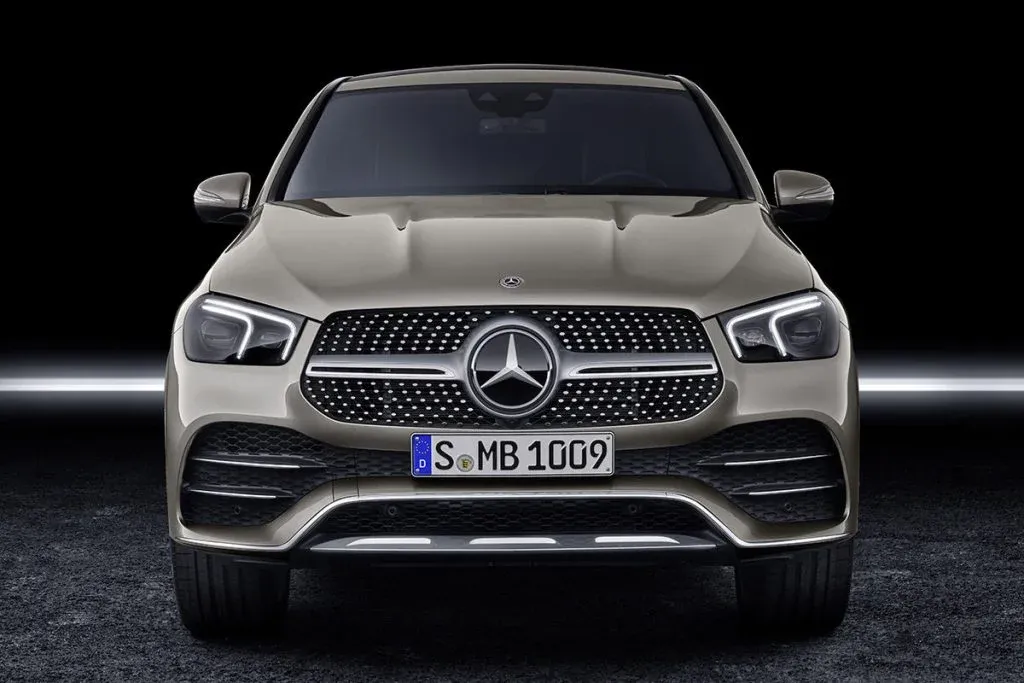 Revised Mercedes GLE as a large luxury SUV on a road, photographed from a front three-quarter angle