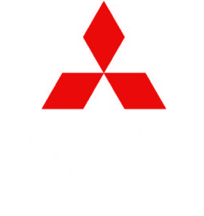Mitsubishi SUV on a road in front of an urban backdrop as a symbol of the brand's coming model offensive