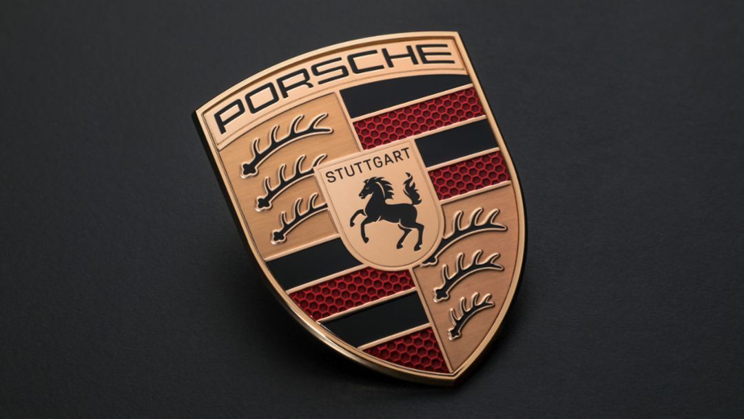 Porsche Taycan at a charging station with a visible high-voltage battery symbol and battery cells in the foreground