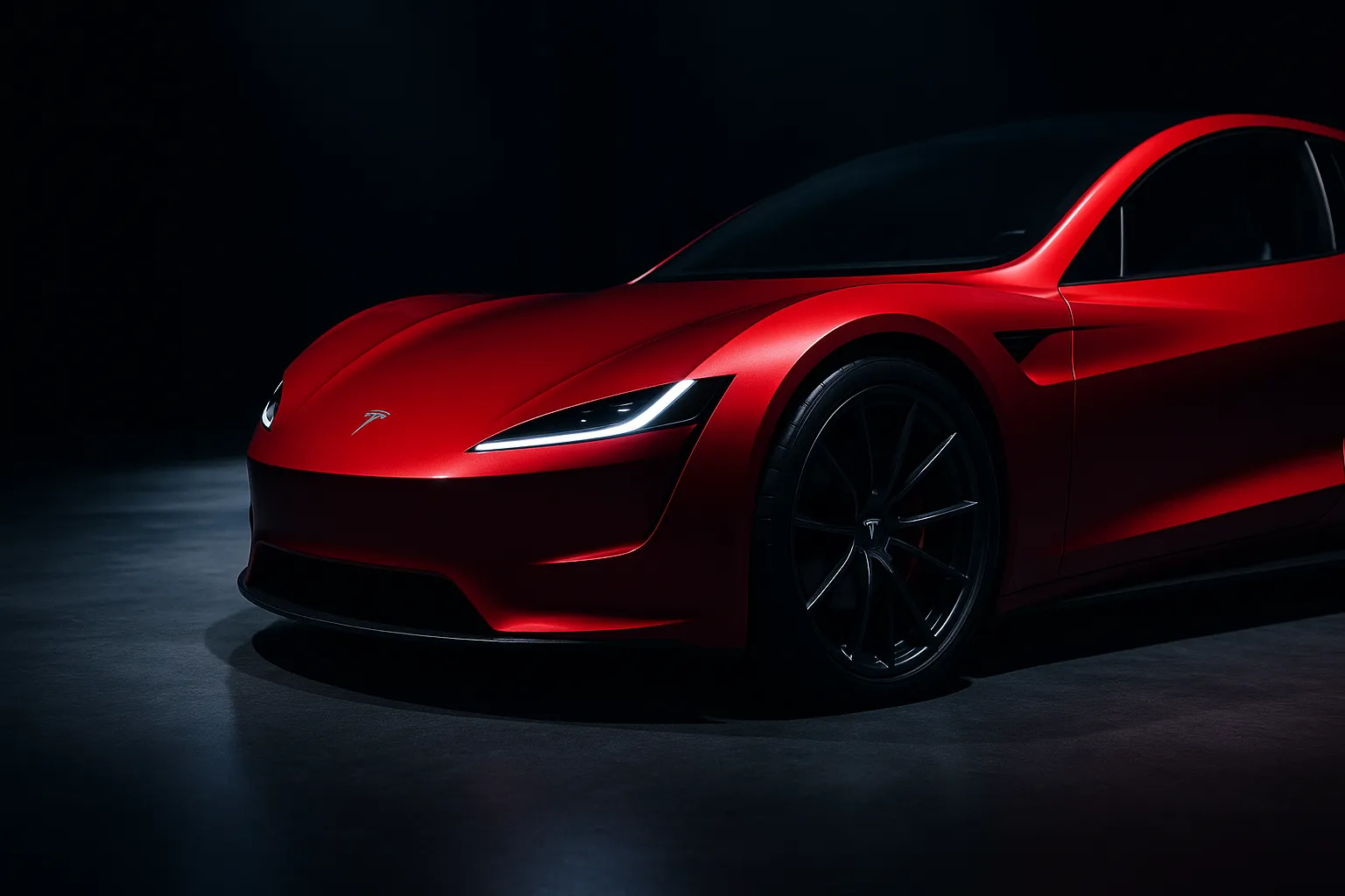 Tesla Roadster als flacher elektrischer Sportwagen auf einer beleuchteten Bühne bei einer Abendpräsentation supporting image 1