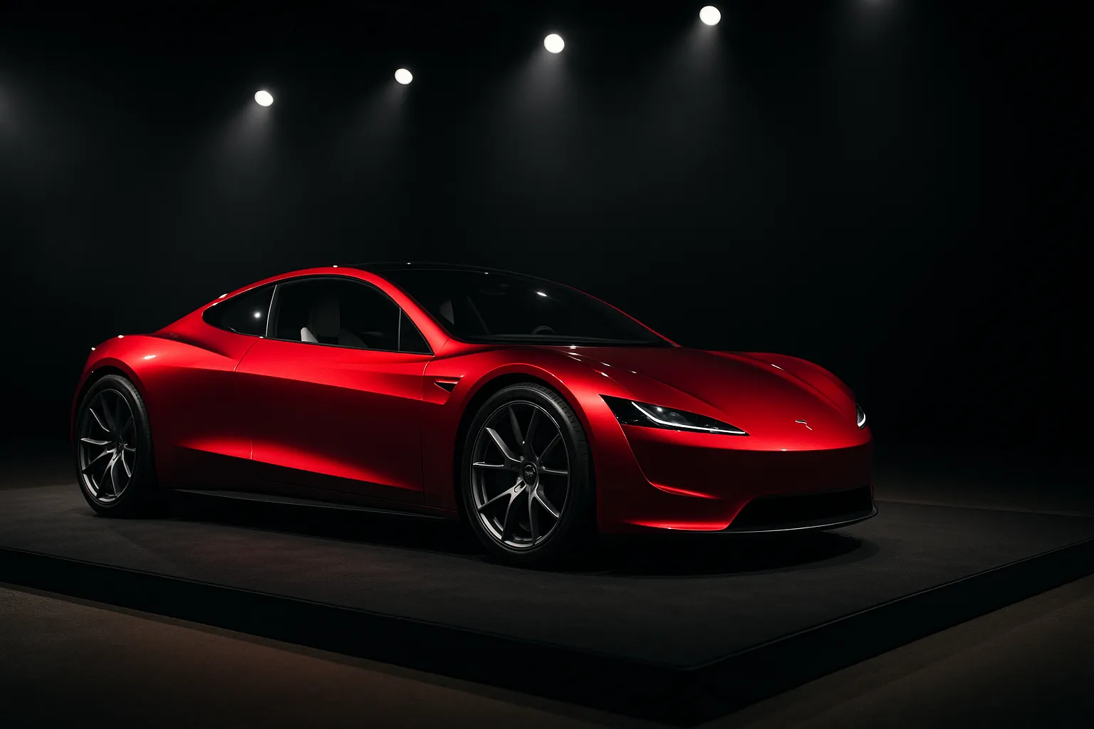 Tesla Roadster als flacher elektrischer Sportwagen auf einer beleuchteten Bühne bei einer Abendpräsentation supporting image 2