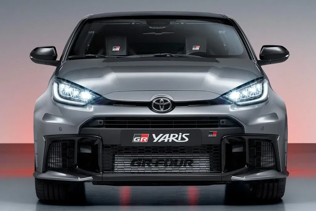 Toyota GR GT as a low-slung supercar on a race track in a dynamic cornering shot